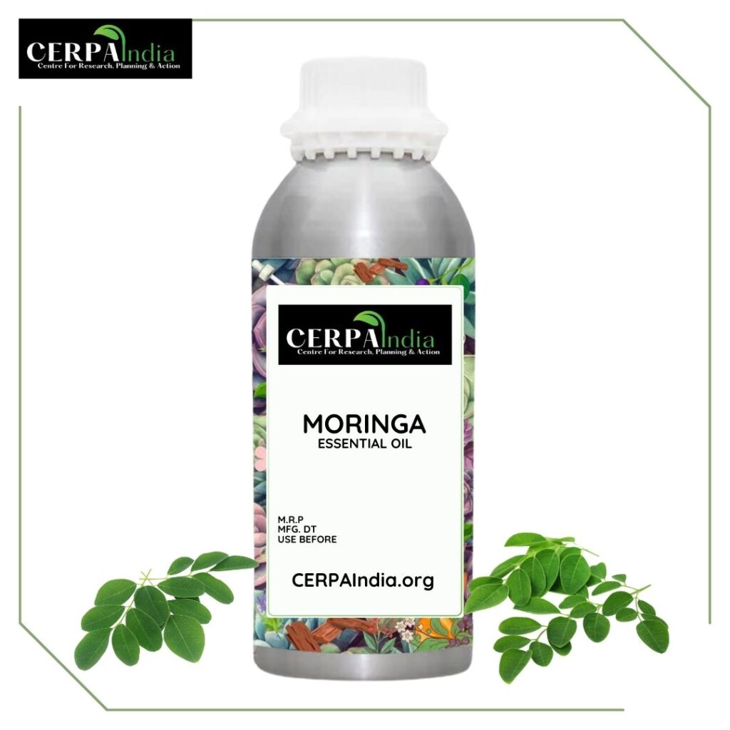 Bottle of Moringa Oil with Fresh Moringa Leaves